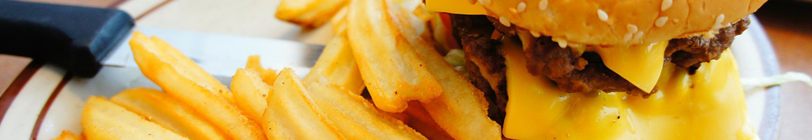 Eating Burger Fast Food at Tomboy's Famous Chiliburgers restaurant in Lawndale, CA.